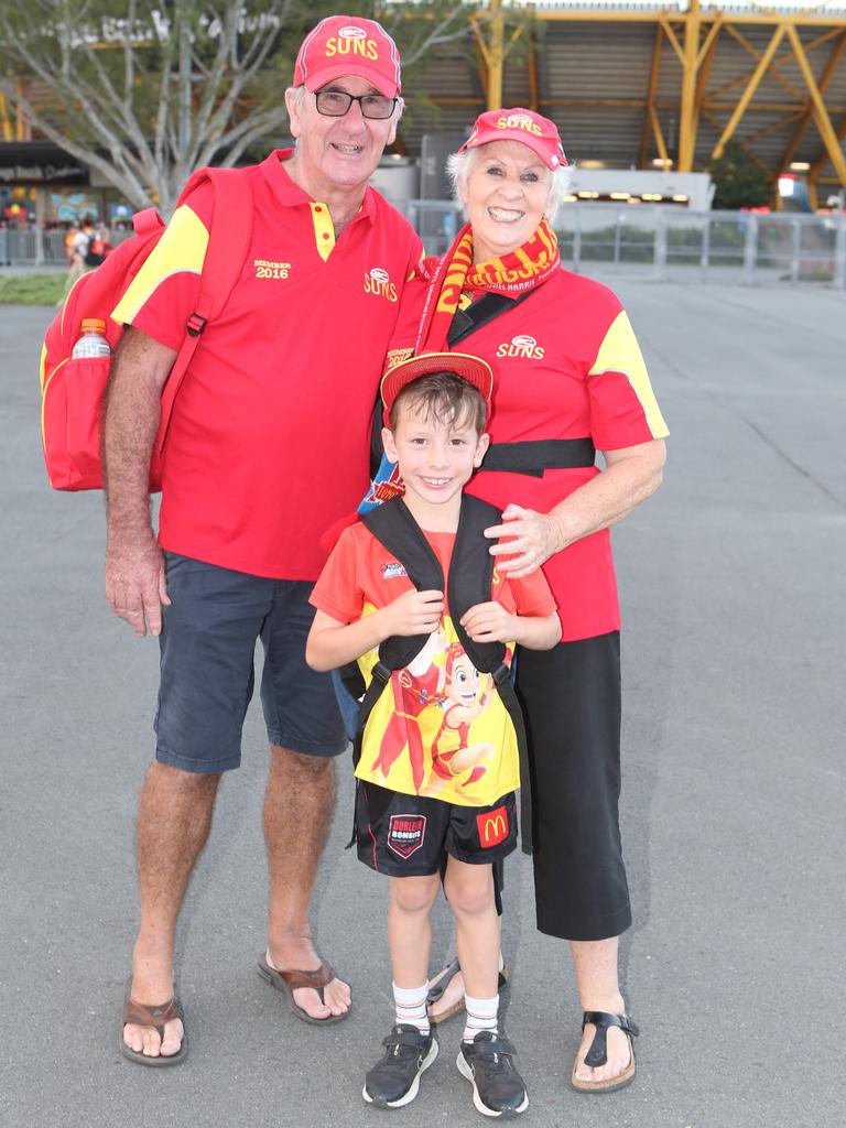 The Gold Coast Suns will host its first AFLW final when they take on the Sydney Swans on Saturday night. John, Sonny and Ros Wright. 11 November 2023 Carrara Picture by Richard Gosling