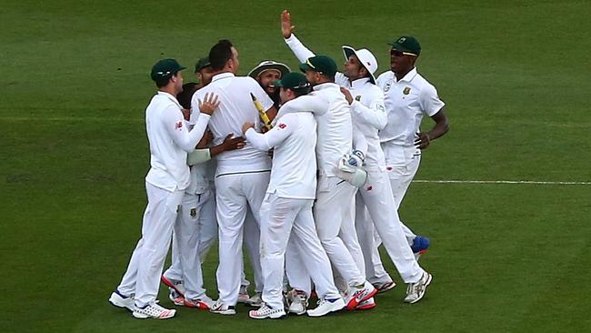 South Africa celebrates after defeating Australia at Blundstone Arena.