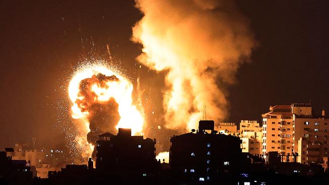 Fire billow from Israeli air strikes in the Gaza Strip, controlled by Hamas, on May 10, 2021. Picture: MAHMUD HAMS / AFP