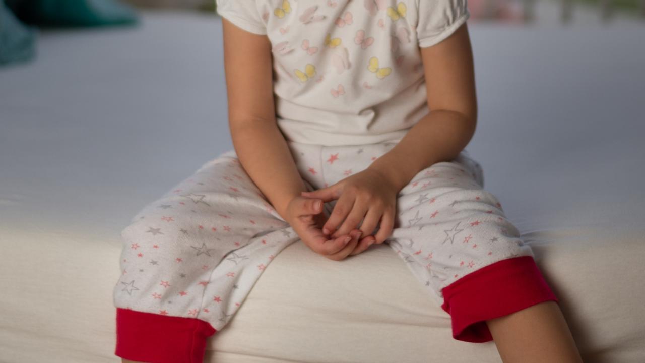 Little girl in hospital, mum in custody over alleged torture, lighter burn