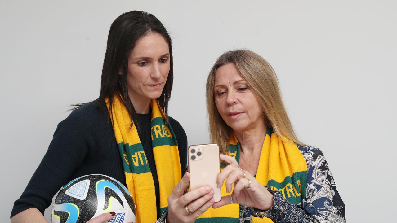 PFA president and former Matilda Kate Gill (L) and chief scientist Jo Fielding check out the BioEye app on a phone. Picture: David Crosling