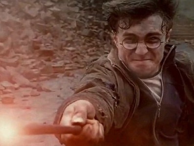 That's magic: The boy wizard uses his wand in his final battle - but who will survive? Read more: http://www.dailymail.co.uk/tvshowbiz/article-1381414/Harry-Potter-And-The-Deathly-Hallows-Part-2-trailer-released.html#ixzz1KsNDfZhf Actor Daniel Radcliffe in scene from film 'Harry Potter & The Deathly Hallows: Part Two'.