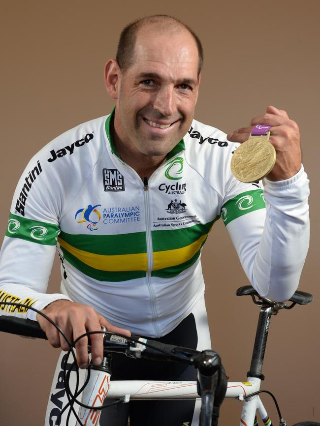 Kieran Modra in 2016, with a gold medal he won at a Paralympics. Picture: Campbell Brodie