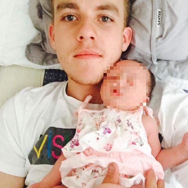 Harrison with his daughter in 2015, the day she was brought home from hospital.