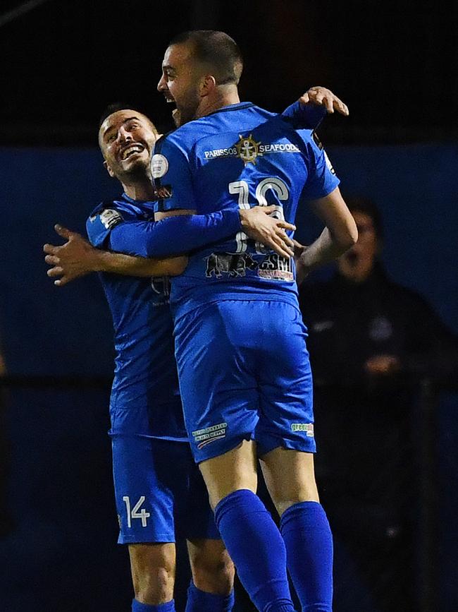 Ioannis Simosis celebrates with scoring a goal with Fausto Erba on Wednesday night. Picture: Mark Brake/Getty Images