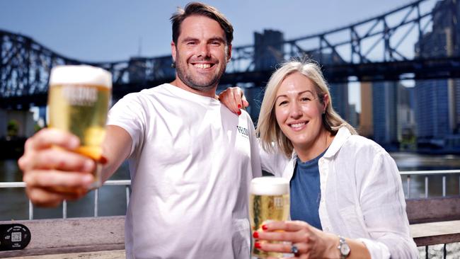 Jim Gold with Anna Streater, drinking the Felons Mid Crush, as the shandy is dead, at Felons Brewery replaced with the Felons Mid Crush beer, which is there low-alc beer, which is a great substitute for a Shandy, Boundary St, Brisbane City - on Friday 27th December 2024 - Photo Steve Pohlner