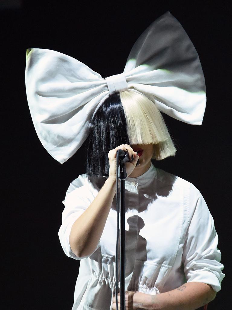 She famously hit her face behind over-size wigs during performances. Picture: AFP Photo/Josh Edelson