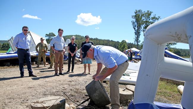 NSW mid north coast flood disaster. Anissa Manton shows Prime Minister Scott Morrison around Stoney Aqua Park at Telegraph Point to survey the damage left by the recent flood waters. Nathan Edwards