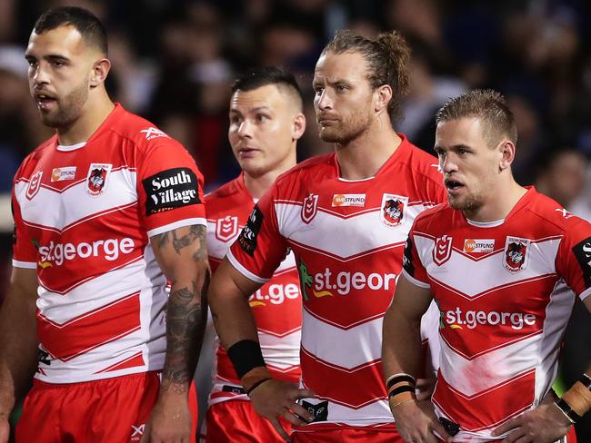 PENRITH, AUSTRALIA - JULY 19: Dragons players look dejected after a Panthers try during the round 18 NRL match between the Penrith Panthers and the St George Illawarra Dragons at Panthers Stadium on July 19, 2019 in Penrith, Australia. (Photo by Matt King/Getty Images)