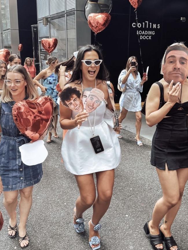 Putra and her friends gathered in the city holding up cut outs of Cameron’s head as they took to the streets. Pic: Instagram