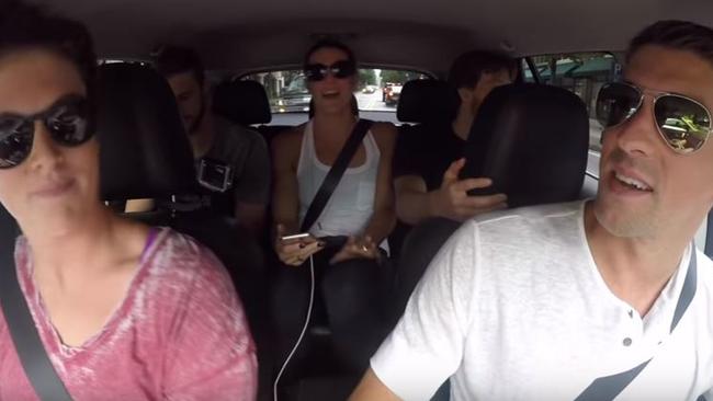 American swimming star Michael Phelps sings car pool karaoke with teammates back in the US.