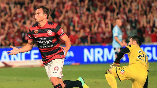 Brendon Santalab celebrates scoring against Sydney FC in 2014. Picture: Mark Evans