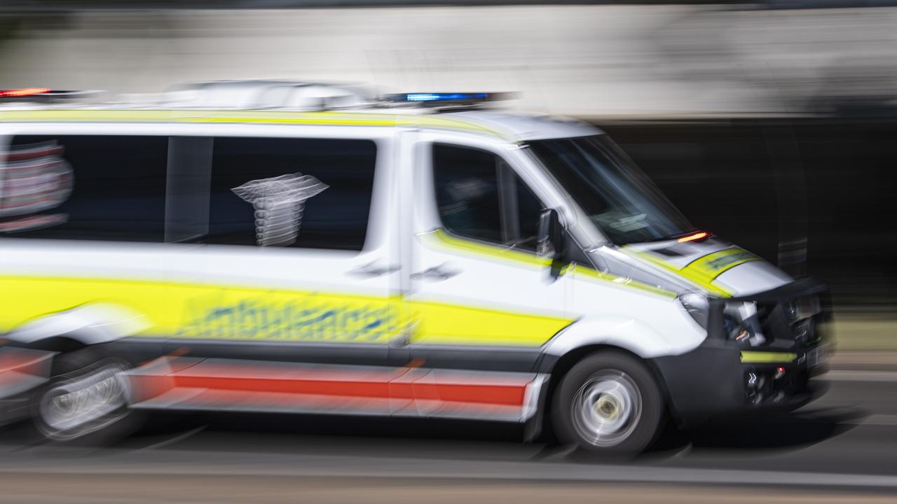 Car smashes into power pole on busy road