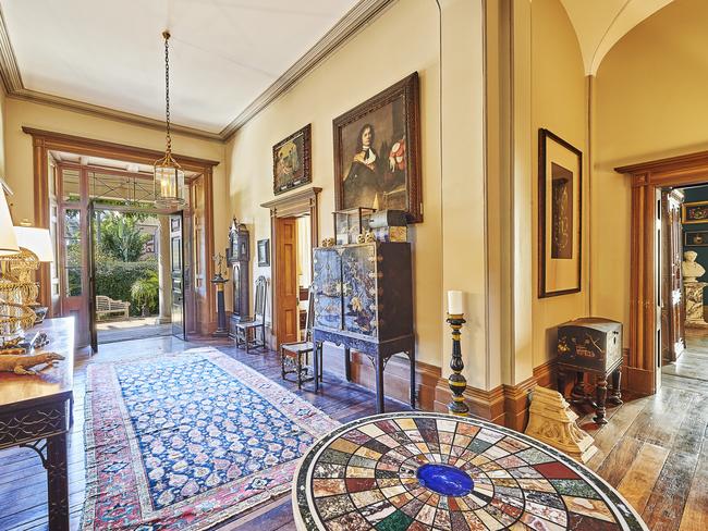 High ceilings and wide hallways are a feature of this generous property.