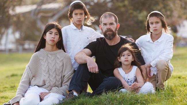 Marc Rosenthal and his children – Gali, 11, Amichai 10, Aviel, 8 and Nili, 4 – at Bondi Beach. Picture: David Swift