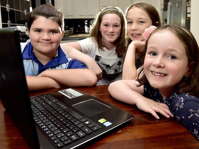 Students Josie, 6, Anna, 8 and  Grace Taylor, 10 with Isabella Dolan, 11 are learning from home during term 2. PICTURE: MATT TAYLOR.