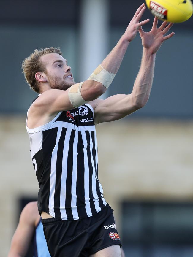 Jack Watts takes a grab in the SANFL last weekend. Picture: Sarah Reed