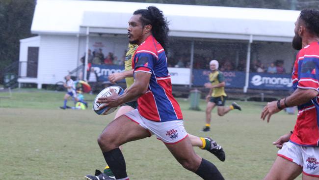 Lepau Feau runs the ball for Bond against Surfers Paradise.