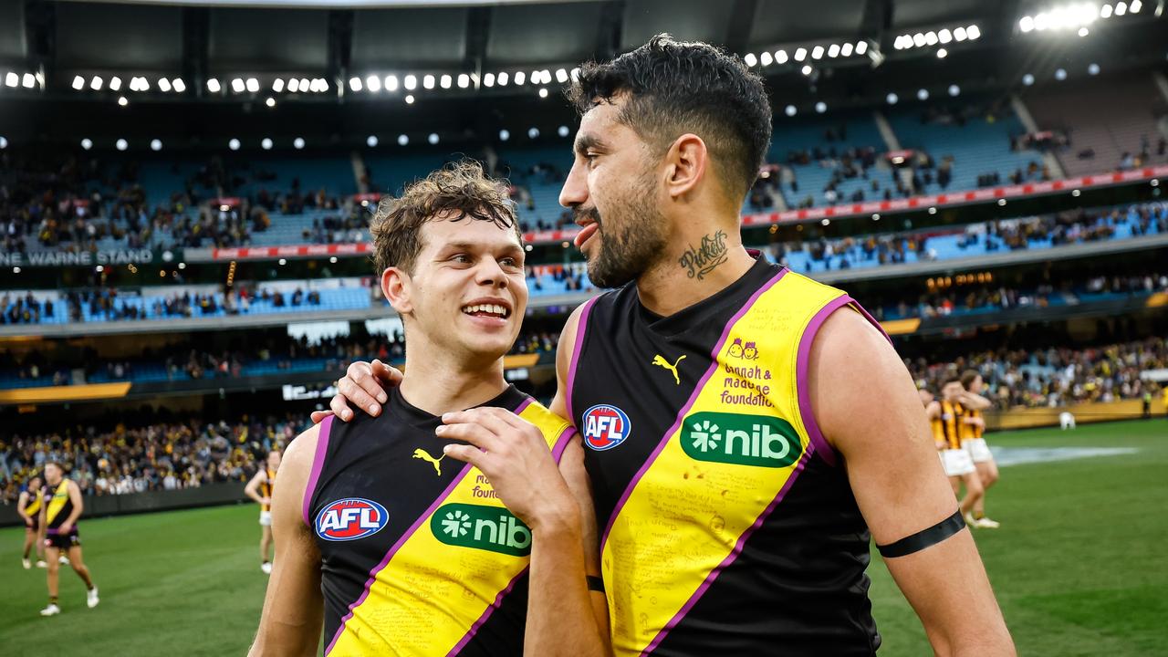 Tigers debutant Matthew Coulthard and Marlion Pickett after the win. Picture: Dylan Burns/AFL Photos