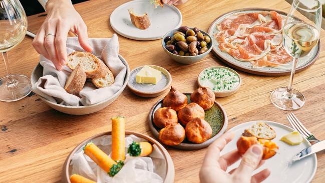 The small bites, including the elegant smoked trout cigars, are a great starting point. Picture: James Morgan