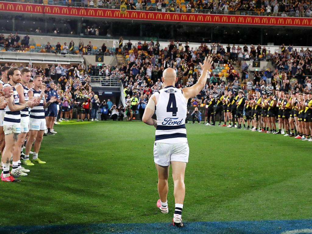 Geelong's Gary Ablett walks off for the last time.