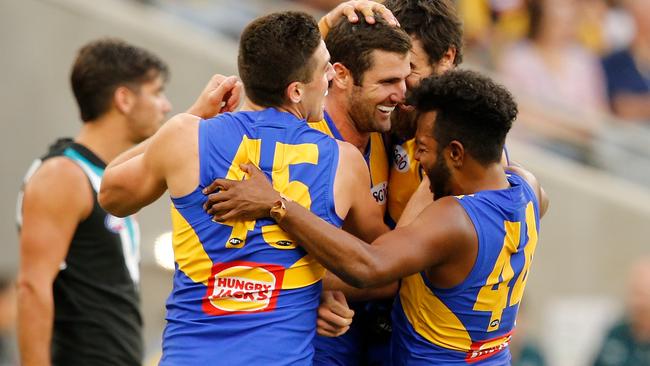 Jack Darling celebrates a goal with teammates.