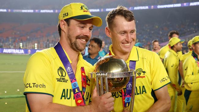 Travis Head and Marnus Labuschagne of Australia poses with the ICC Men's Cricket World Cup Trophy at Narendra Modi Stadium in Ahmedabad, India. Picture: Getty