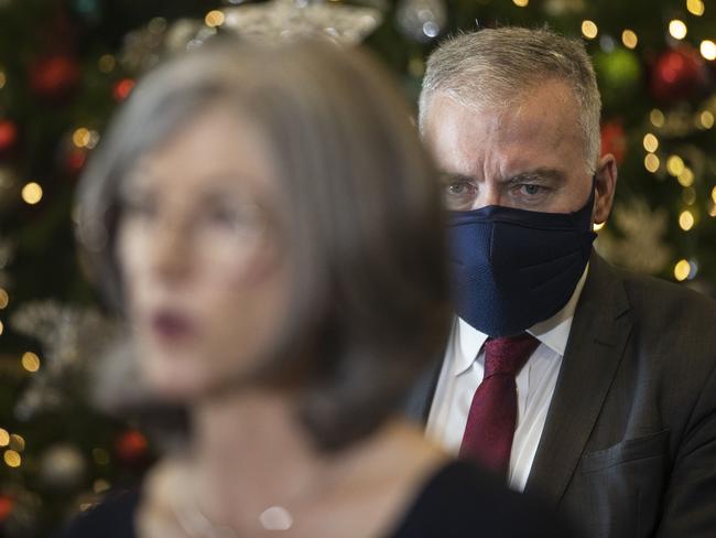 Stephen Wade stares down chief public health officer Professor Nicola Spurrier at a Covid press conference in late 2021. Picture: Simon Cross