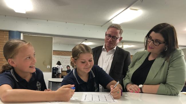 Murwillumbah High School year seven students Eva Tiffen, 12, and Jazmin Harris, 13, with Ben Franklin MLC and education Minister Sarah Mitchell. Photo: Jessica Lamb