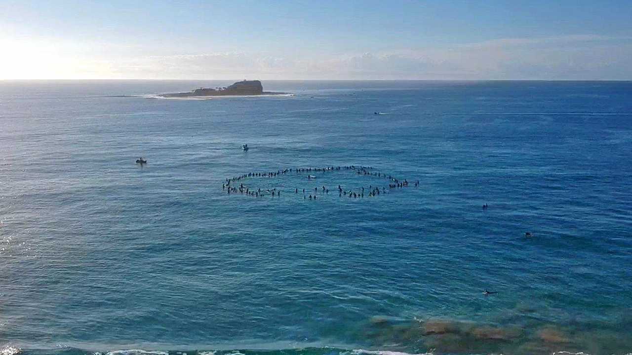 Hundreds turned out at Mudjimba Beach to pay respect. Picture: Contributed