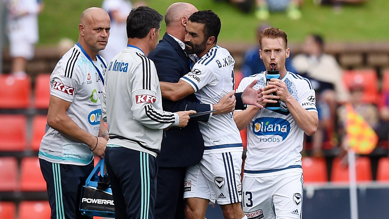 Fahid Ben Khalfallah of the Victory is congratulated by coach Kevin Muscat after scoring a goal during the round 13 A-League match between the Newcastle Jets and Melbourne Victory at Hunter Stadium in Newcastle, on Sunday, Jan. 3, 2016. (AAP Image/Dan Himbrechts) NO ARCHIVING, EDITORIAL USE ONLY