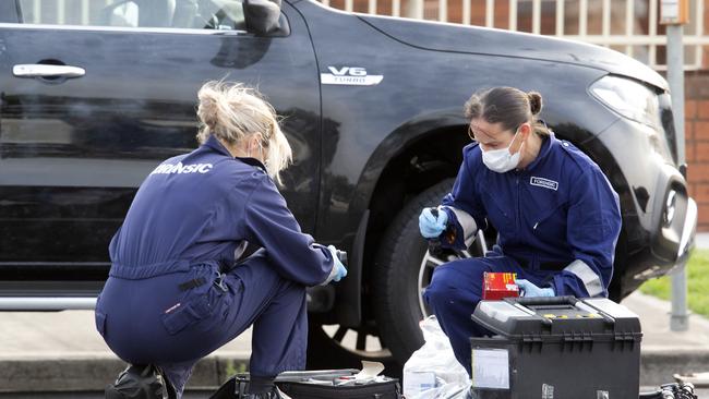 Forensic's take finger prints from Mercedes Ute parked on Dalton Rd. Picture: Sarah Matray