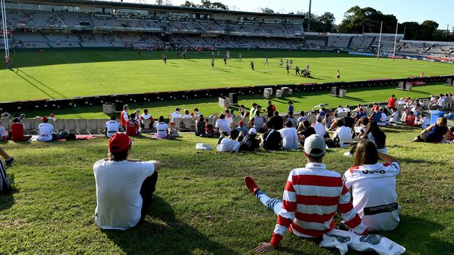 Fans take in the action at UOW Jubilee Oval during the Round 4 NRL match between the Dragons and Warriors.