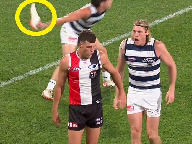 Gryan Miers throws Rowan Marshall's boot away.