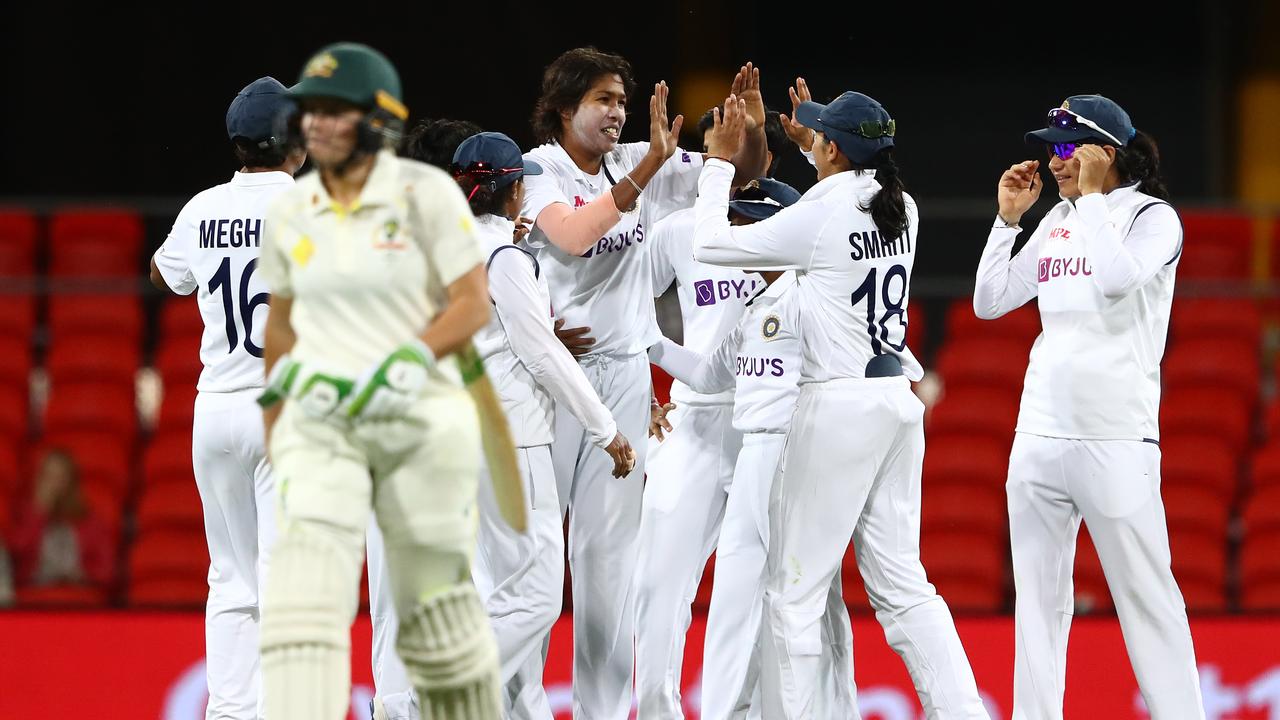 Jhulan Goswami celebrates the dismissal of Alyssa Healy. Photo by Chris Hyde/Getty Images