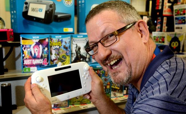 Tweed City Kmart general merchandise manager Randy Hays with the new WiiU. Picture: John Gass