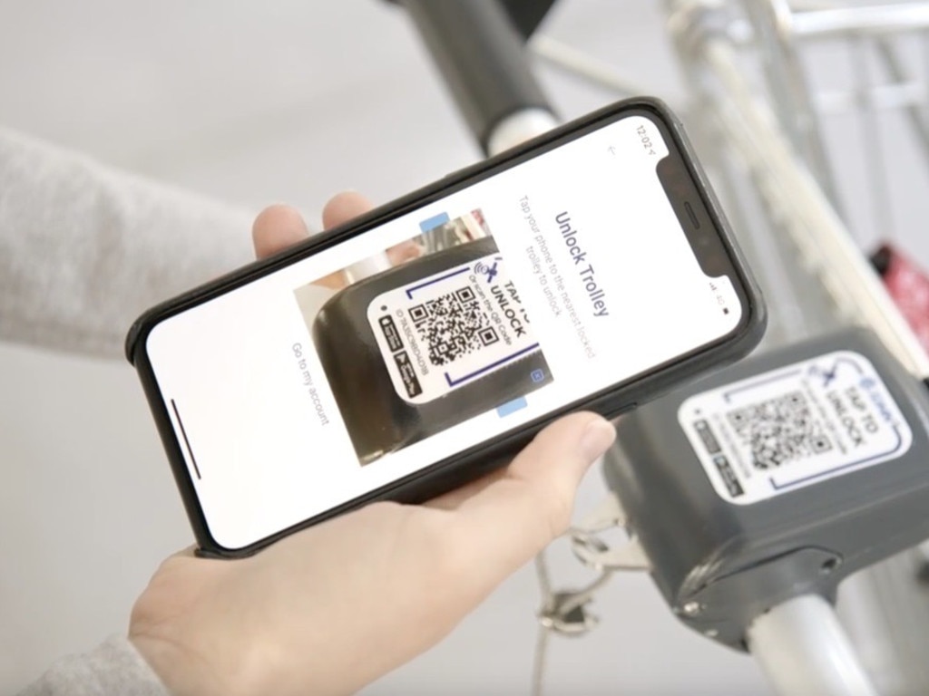 The world-first technology allows users to unlock trolleys using a QR code and the sMart Shop App. Picture: Supplied by Trolley Data Management Network