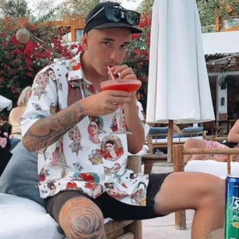 Lachie enjoying a cocktail during a previous visit to Bali. Picture: Instagram