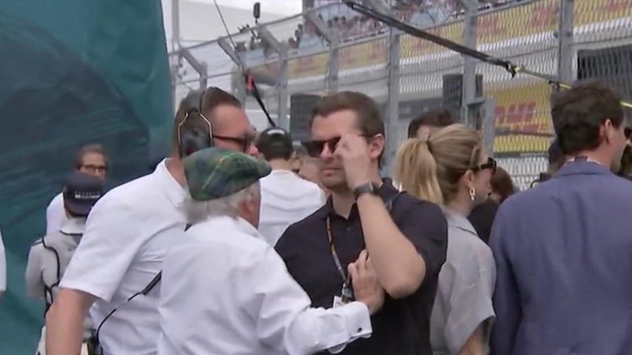 Jackie Stewart (front) was confronted by security on the F1 grid at Miami. Photo: Fox Sports