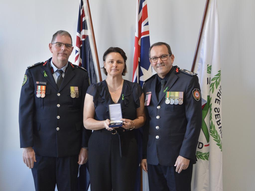 Sugarloaf Rural Fire Brigade former crew leader Garry Tutt received a Posthumous QFES Medal, accepted by his daughter Nikki, for his diligent and ethical service during Rural Fire Service Week on Saturday, August 3rd. Photo: Jessica Klein