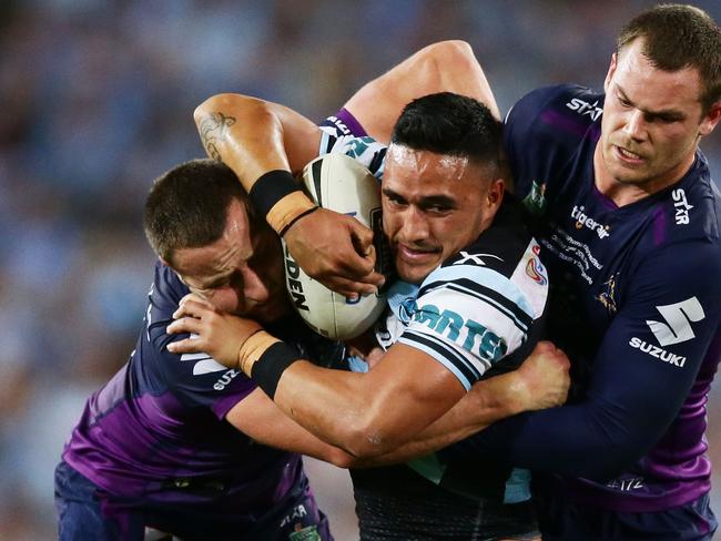 Sharks winger Valentine Holmes is tackled during Cronulla’s 2016 NRL grand final win over the Melbourne Storm at ANZ Stadium. Picture: Getty Images