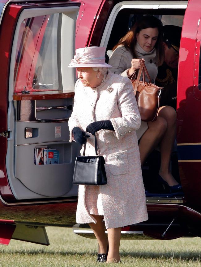 Queen Elizabeth II, accompanied by Samantha Cohen, disembarks her Sikorsky Helicopter in November 2016. Picture: Getty Images