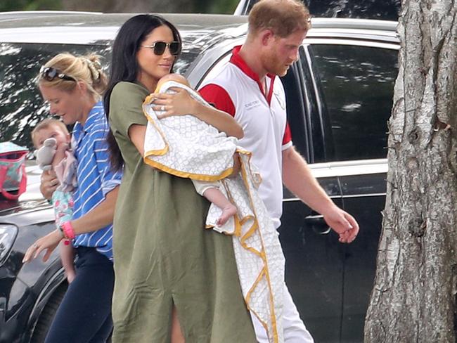 Prince Harry and Meghan, Duchess of Sussex with baby Archie at the King Power Royal Charity Polo Day. Picture: Chris Jackson/Getty