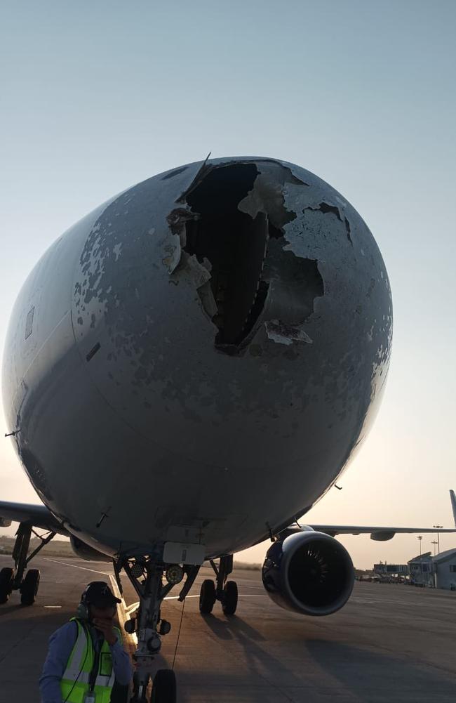 The passenger plane battled turbulence, hailstorm and a huge hole reportedly from a bird hitting the nose of the aircraft. Picture: Tim/RashidF/SWNS