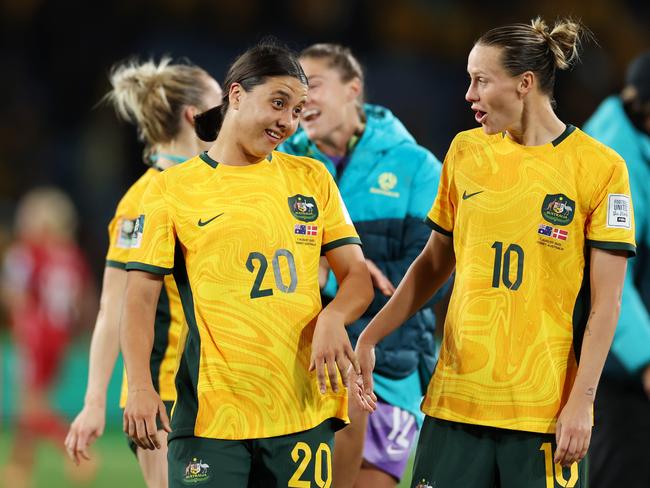 Sam Kerr (left) and Emily van Egmond celebrate after Australia’s win over Denmark. Picture: Cameron Spencer/Getty Images