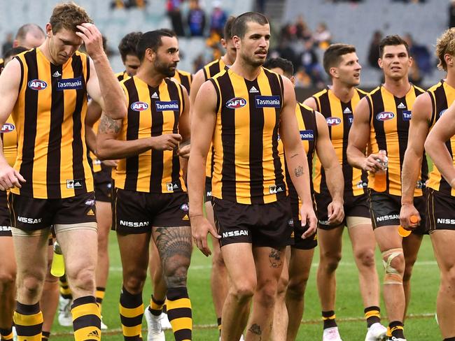 The Hawks react after the Round 2 AFL match between the Hawthorn Hawks and the Western Bulldogs at the MCG in Melbourne, Sunday, March 31, 2019. (AAP Image/Julian Smith) NO ARCHIVING, EDITORIAL USE ONLY