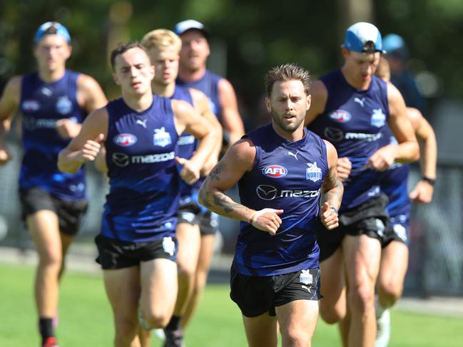 Caleb Daniel running at North Melbourne training as he works his way back from a hamstring issue. Picture: David Crosling