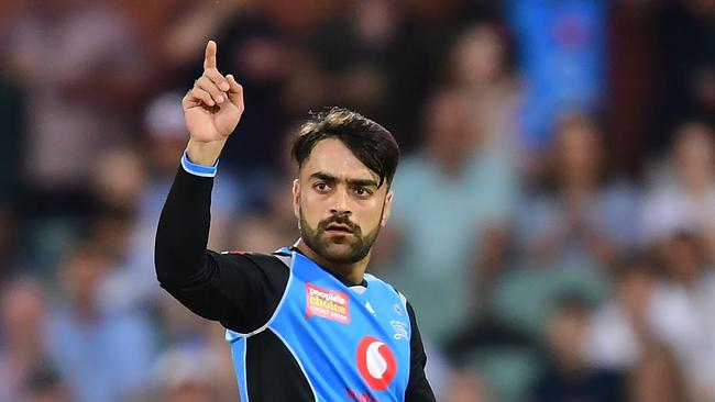 Rashid Khan of the Adelaide Strikers celebrates after taking the wicket of Dwayne Bravo of the Melbourne Stars earlier in 2019. Picture: Mark Brake/Getty Images.