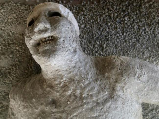 A plaster cast captures the horror of a victim of the volcanic eruption of Mount Vesuvius, which in A.D. 79 destroyed the ancient town of Pompeii, near modern-day Naples, Italy. Picture: AP / Michelle Locke