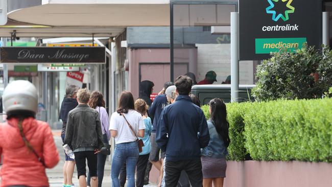 Young people in queues outside a Sydney Centrelink. Picture John Grainger